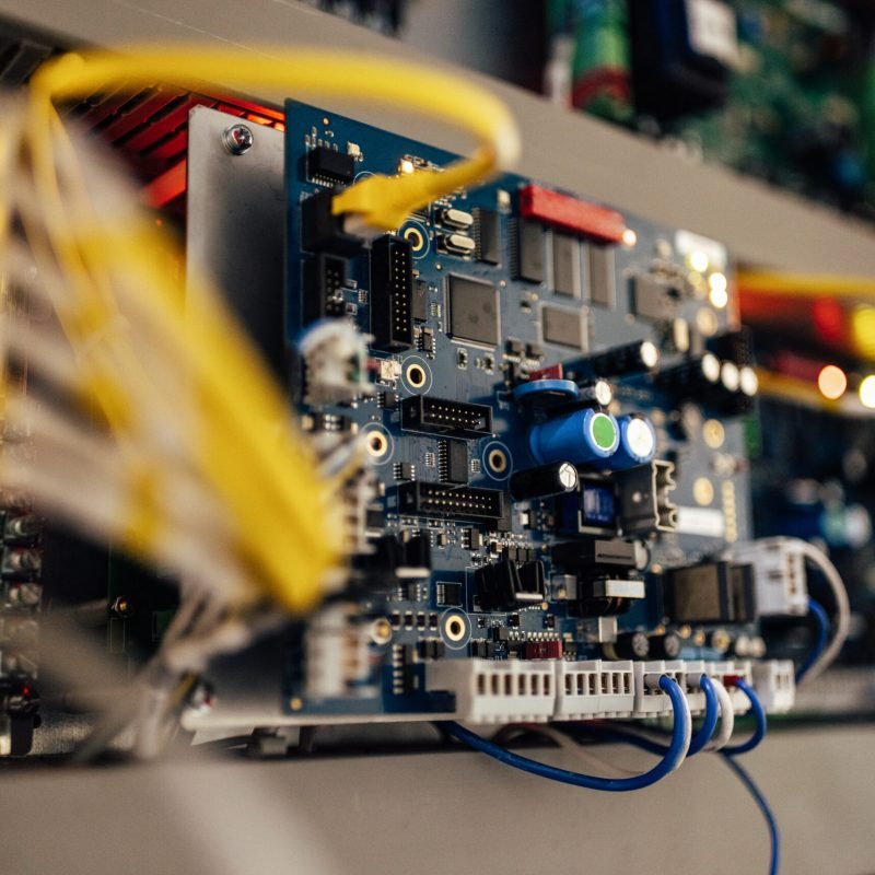 Closeup of a motherboard, being setup on the computer, for work.